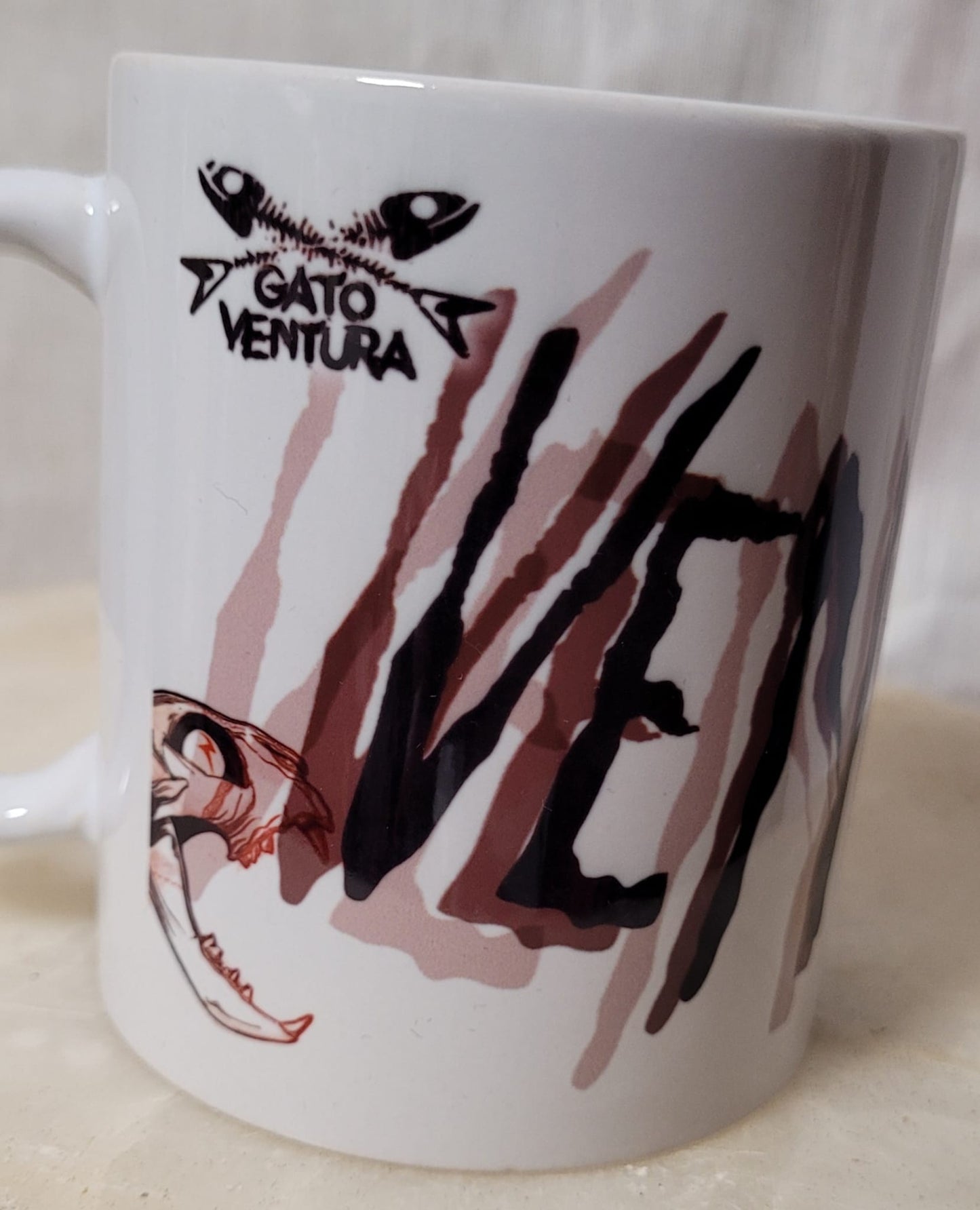 Taza Vendrás desenfocada