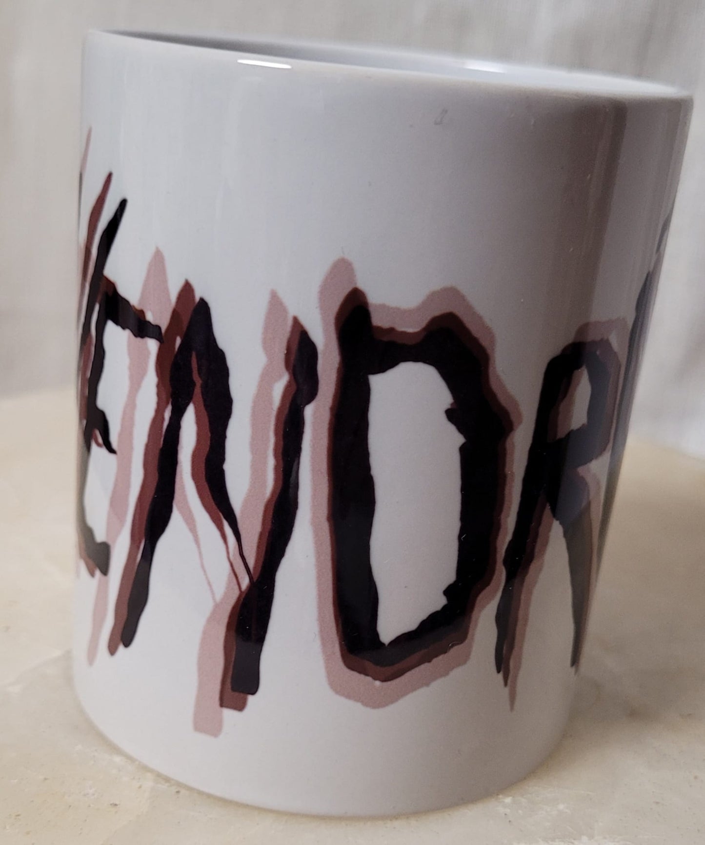 Taza Vendrás desenfocada